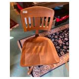 Vintage wooden rolling office chair