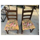 2 wooden and rose pattern chairs