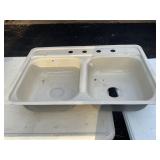 4 hole enamel sink - appears new