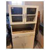 White tall metal cabinet with doors