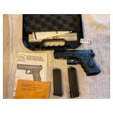 Glock 19- 9mm auto with 2 mags and laser