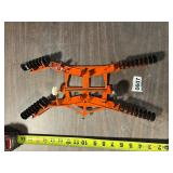 ERTL orange toy disc