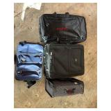 4 suitcases and bags