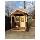 Derksen building with porch and AC