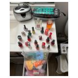 Perfume, curlers, polish, hair pony holders