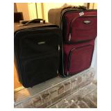 2 rolling suitcases
