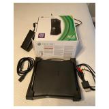 XBOX 360 console and power cord