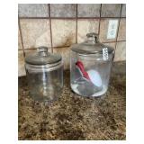 2 glass canisters