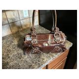 Leather style guess ostrich resembling purse