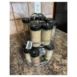 Spice rack with glass jars