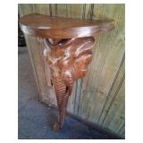 Hand carved wooden elephant shelf