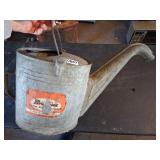 Vintage Oil servicing galvanized can