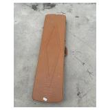 Light brown hard plastic gun case. Padded inside