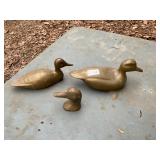 3 brass ducks