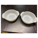 Two white fire king dishes