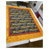 Machined throw quilt