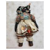 Black Americana doll -spool of thread