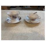2 tea cups and saucers