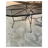 Black oval wrought, iron table
