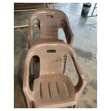 4 brown/tan plastic chairs