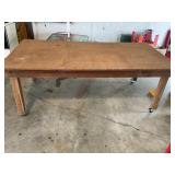 Rolling wooden table 48 x  97