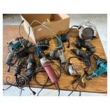 Assorted electric power tools.