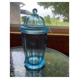Large blue glass vase with lid