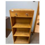 Wooden bookshelf with drawer