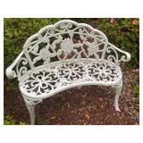 White wrought iron bench