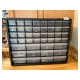 Black plastic nut/bolt bin with crafting contents