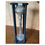 Vintage wood and glass hourglass