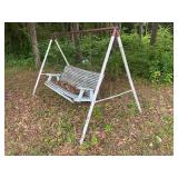 Porch swing with a frame