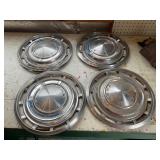 4- vintage Futura hubcaps