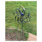 Metal pinwheel decor with glass blue ball