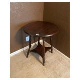Small wooden round table