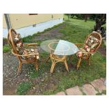 Bamboo patio set with glass top table