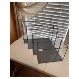 Four square metal shelves