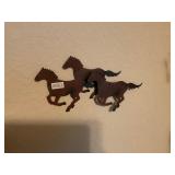 Three metal horse decor