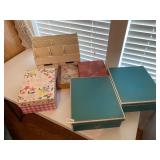 Five decorative storage boxes and mail holder