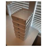 6 white, lidded storage boxes
