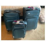 3 piece blue rolling suitcase set