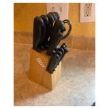 Kitchen knives and wooden block