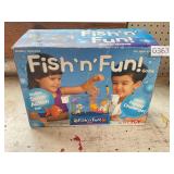 Kids, fish and fun toy