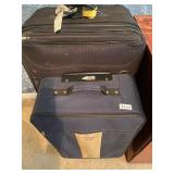 Two rolling suitcases
