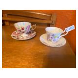 Two tea cups and saucers