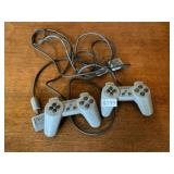 2- corded Sony PlayStation controls