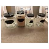 4 glass canisters - can write in chalk on labels