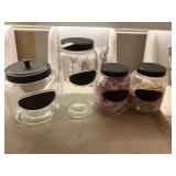 4 glass canisters - can write in chalk on labels
