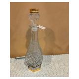 Beautiful crystal glass decanter with gold trim