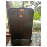P- black hard plastic rolling suitcase